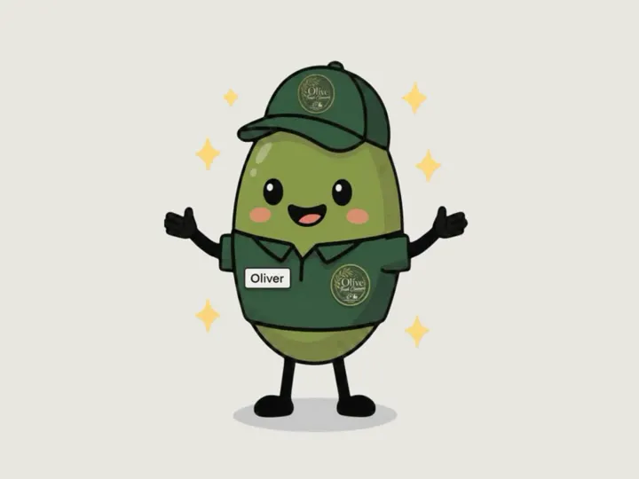 Oliver, the Olive Fresh Cleaners mascot, a smiling olive in a green cap and polo
